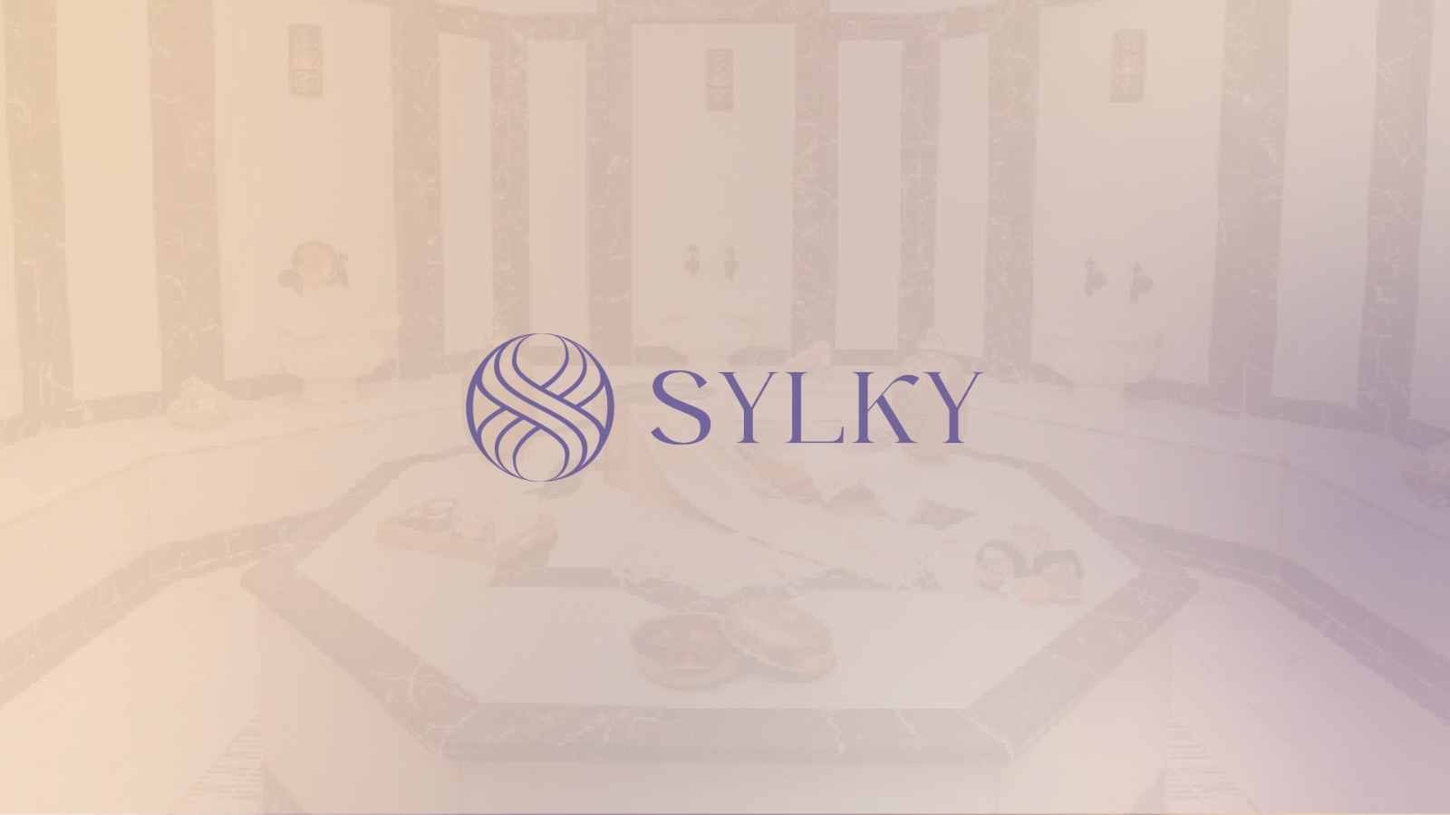 Sylky — logo na tle łaźni hammam